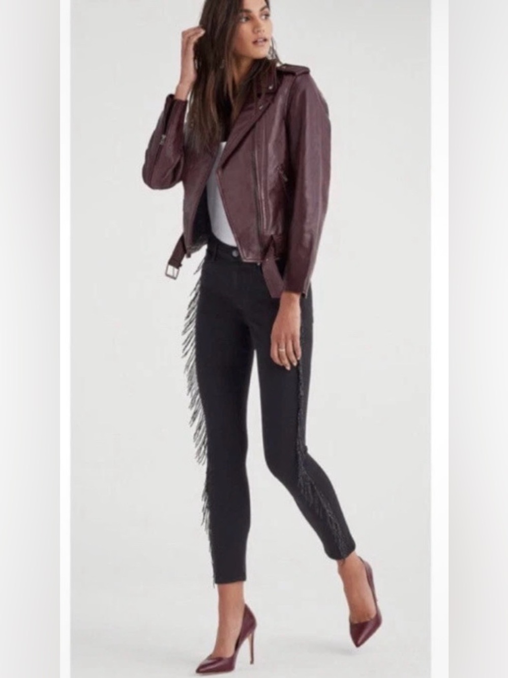 7 For All Mankind Black Skinny Jeans with beadedFringe on both sides.